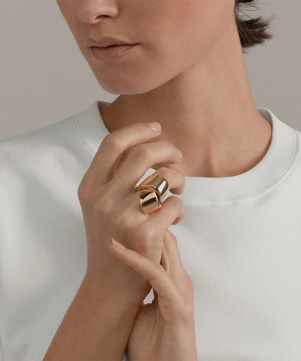 Peelerie jewelry piece in midnight luxury editorial product photo, high-contrast studio lighting