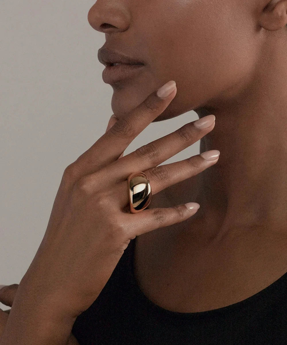 Peelerie jewelry piece in midnight luxury editorial product photo, high-contrast studio lighting