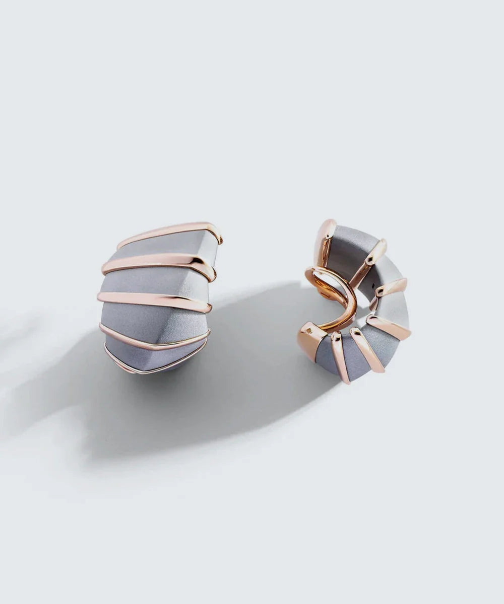 Peelerie jewelry piece in midnight luxury editorial product photo, high-contrast studio lighting