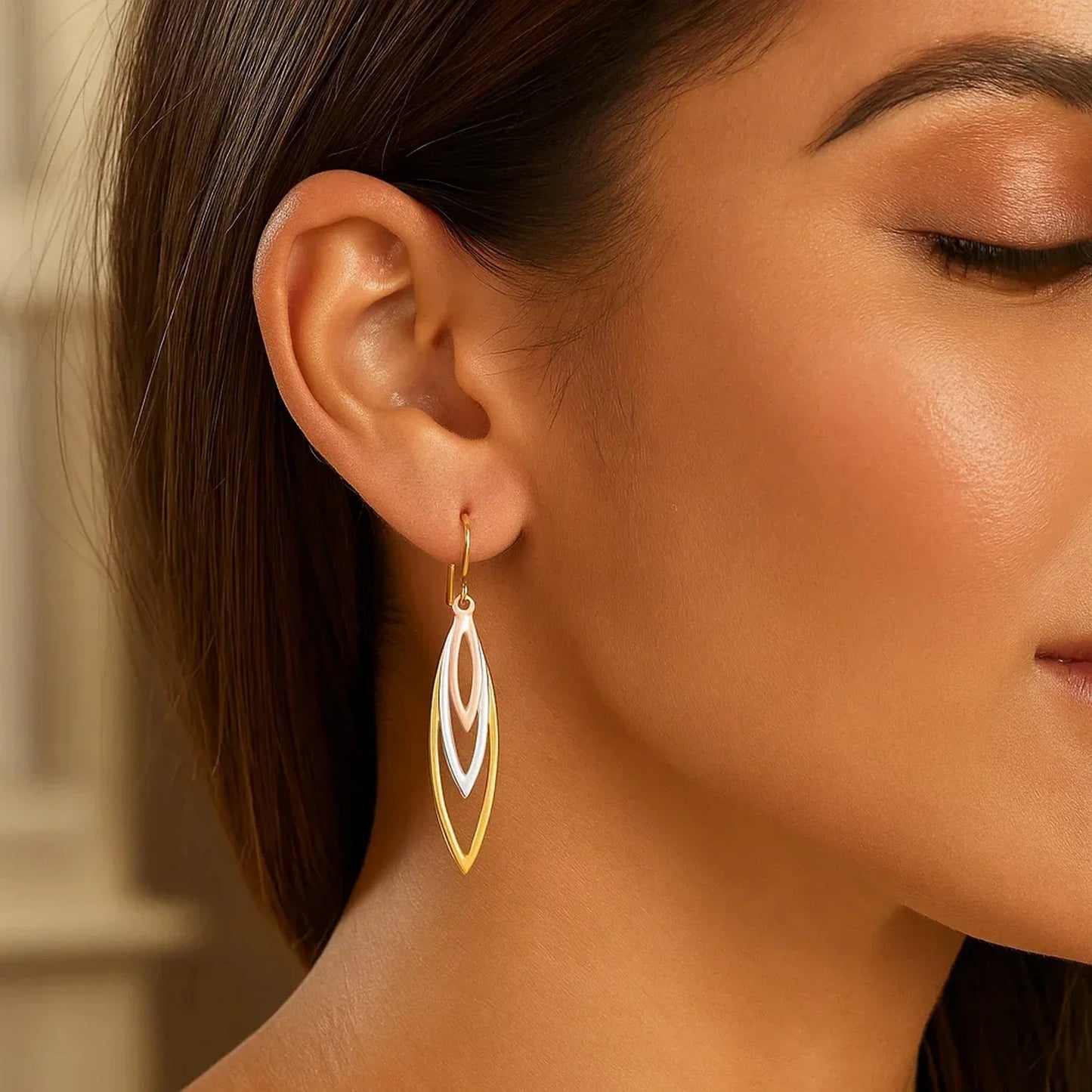 Tri-Tone Graduated Open Marquise Earrings in 10k Yellow, White, and Rose Gold - Peelerie