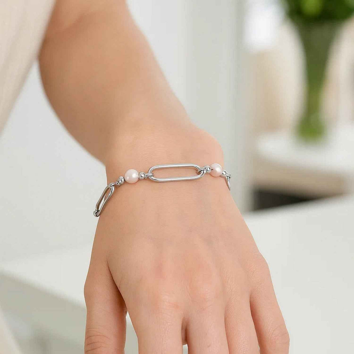 Sterling silver, rhodium plated bracelet set with pearl