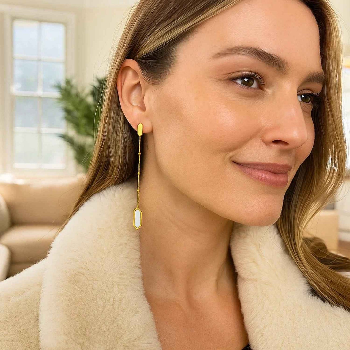14k yellow gold drop earrings set with mother of pearl
