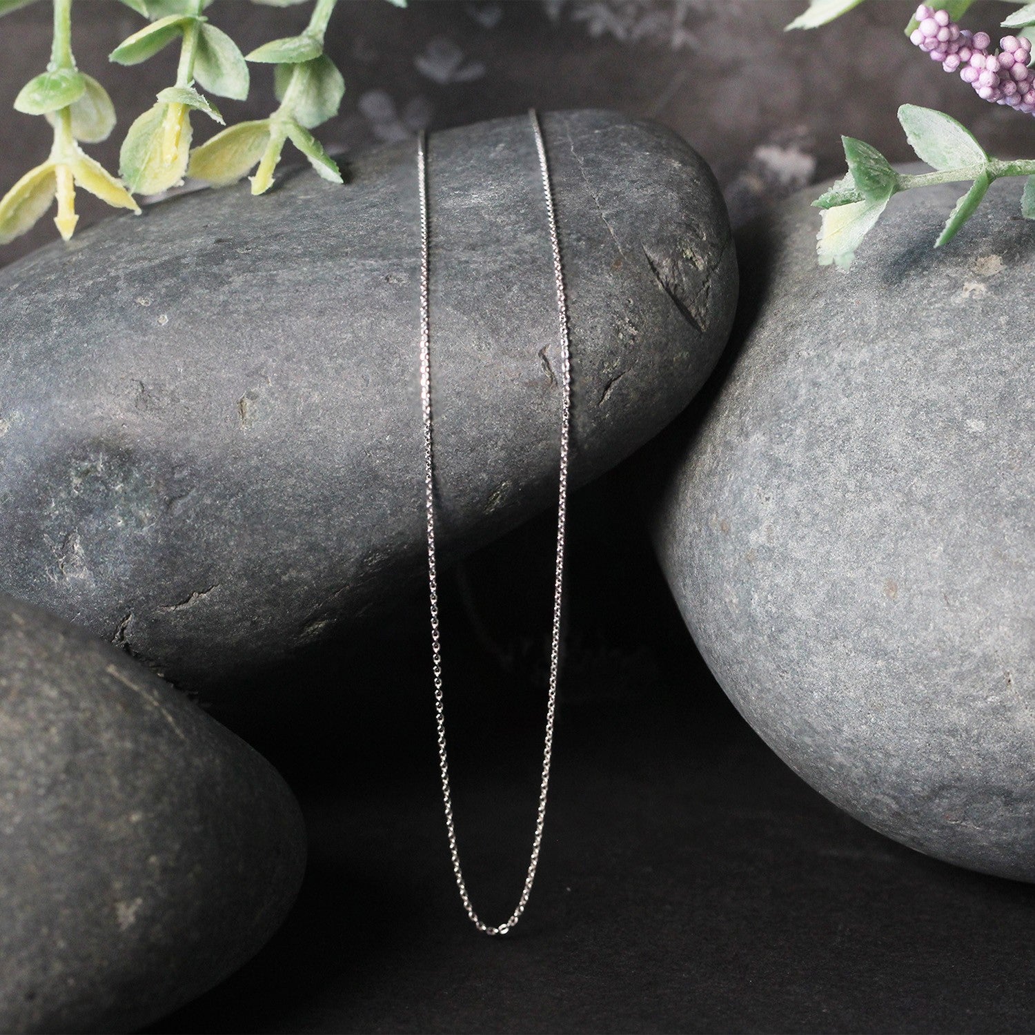 14k White Gold Cable Link Chain (0.50 mm) in a sleek high-contrast midnight luxury editorial style