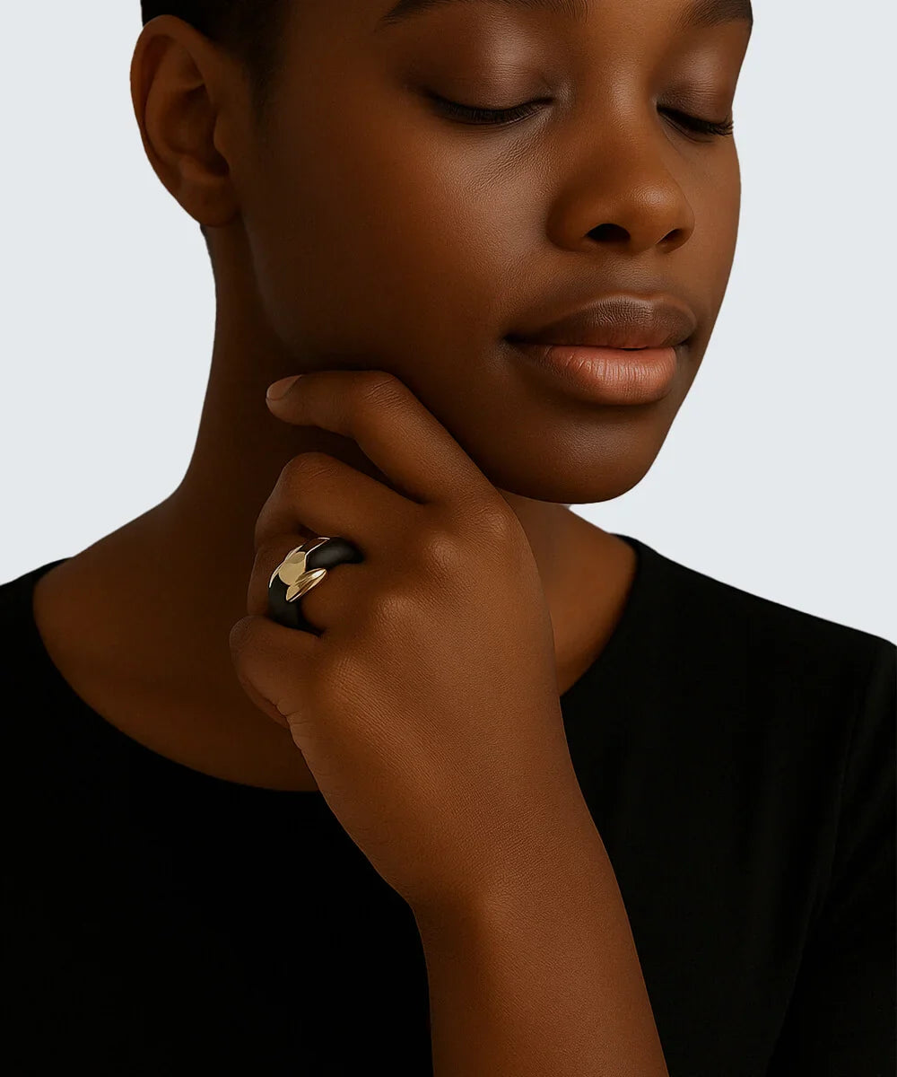 Peelerie jewelry piece in midnight luxury editorial product photo, high-contrast studio lighting