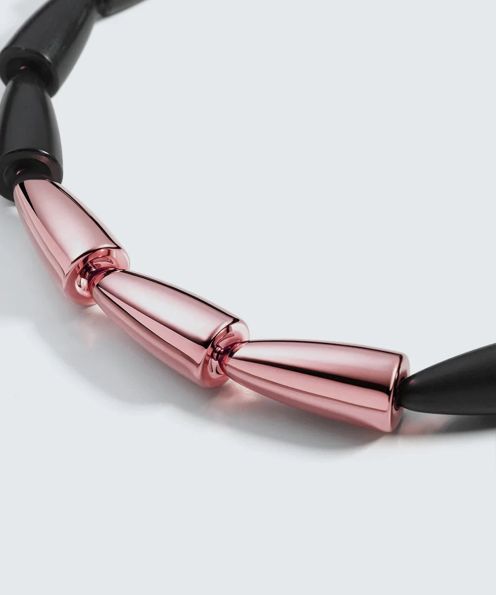 Peelerie jewelry piece in midnight luxury editorial product photo, high-contrast studio lighting