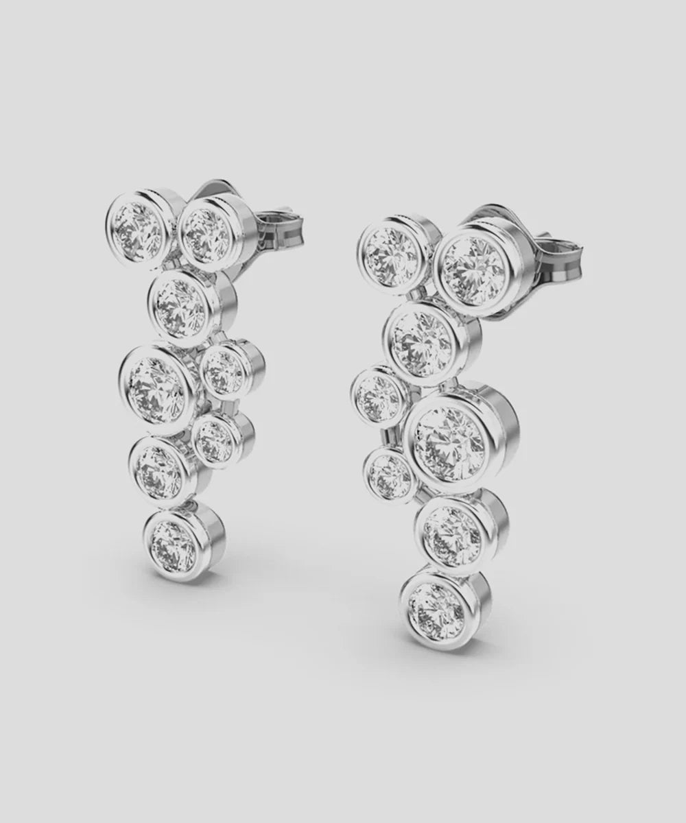 Moska Stud Earrings in a sleek high-contrast midnight luxury editorial style