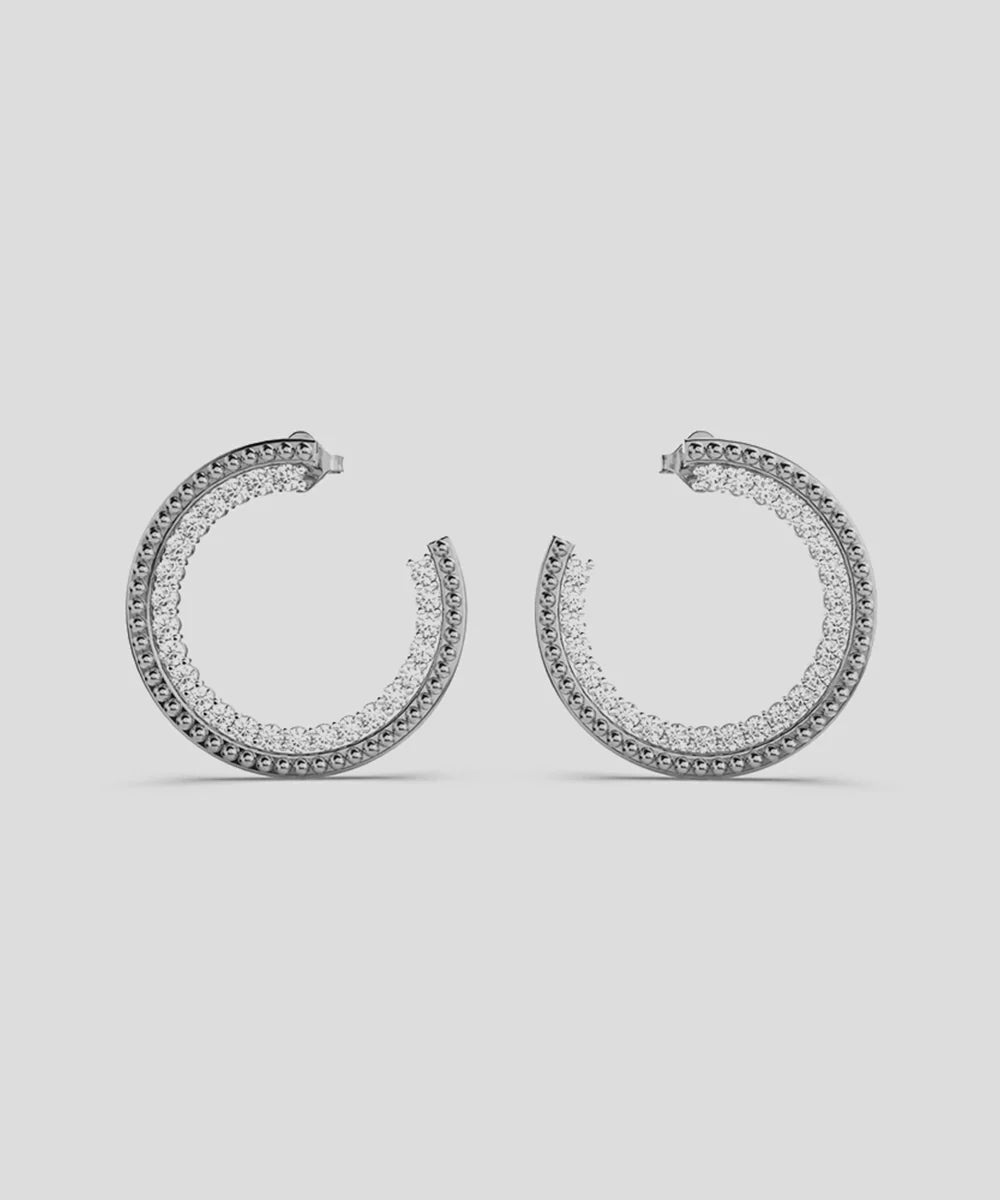 Peelerie jewelry piece in midnight luxury editorial product photo, high-contrast studio lighting