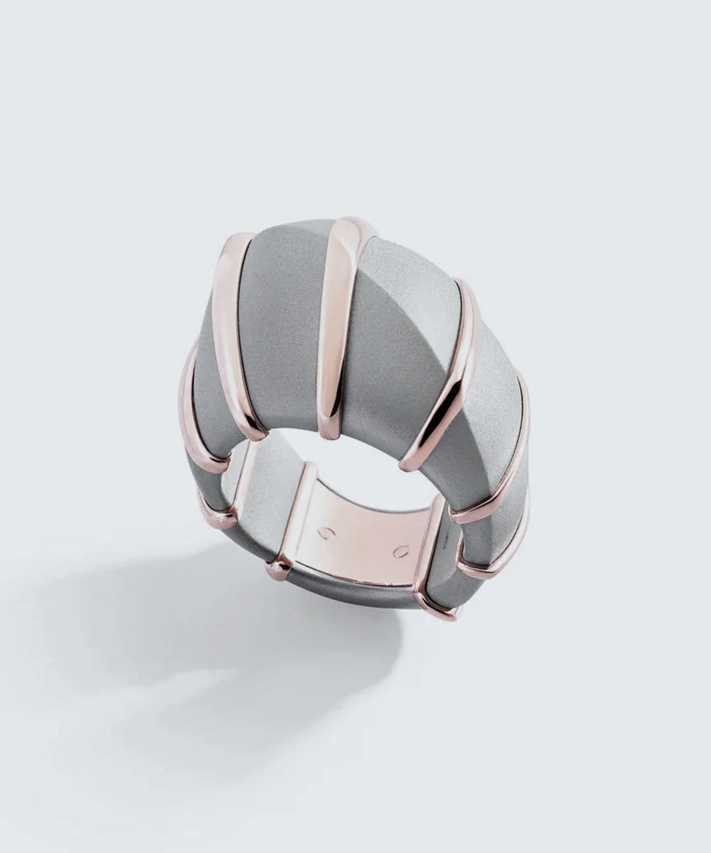 Peelerie jewelry piece in midnight luxury editorial product photo, high-contrast studio lighting