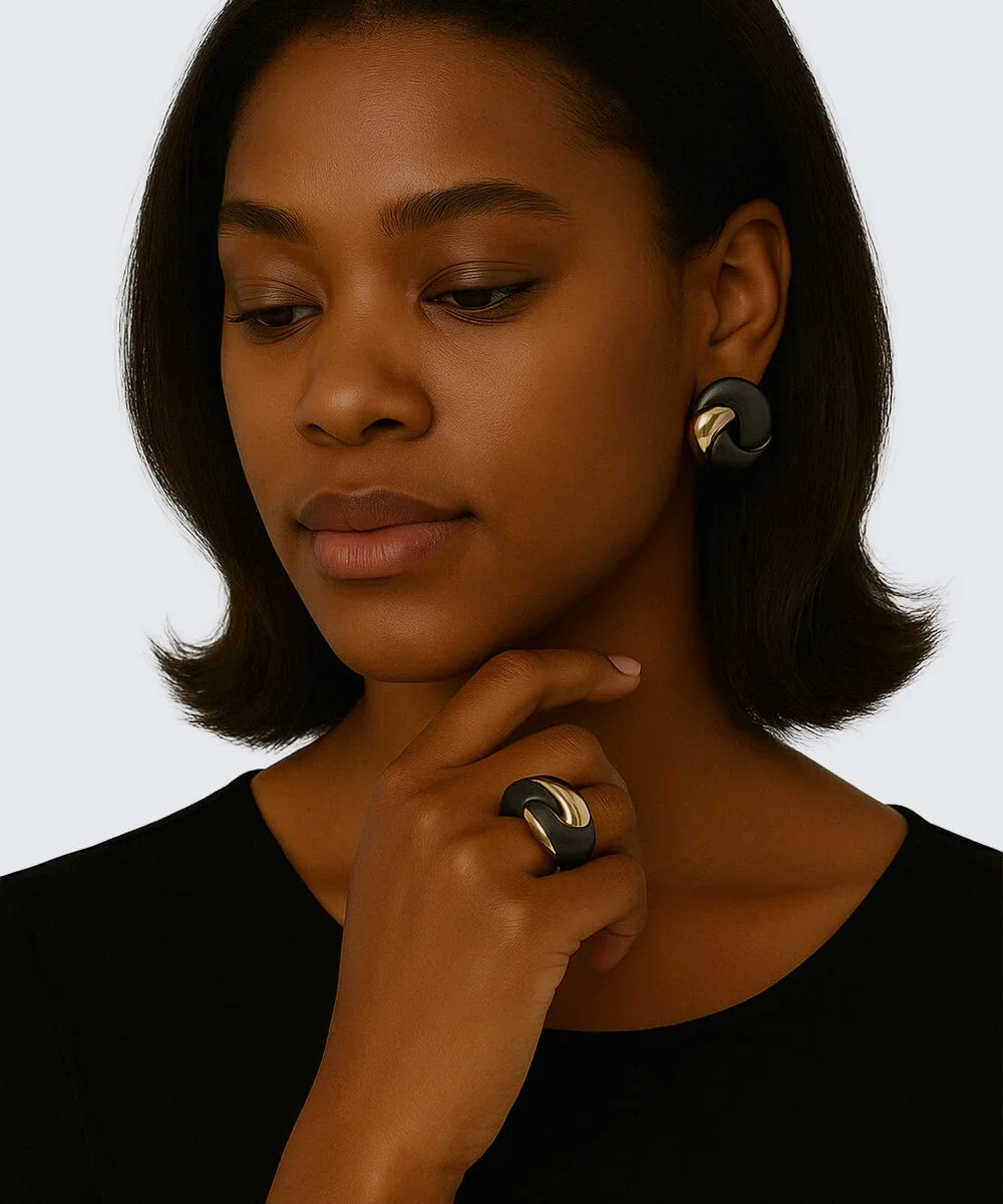 Peelerie jewelry piece in midnight luxury editorial product photo, high-contrast studio lighting