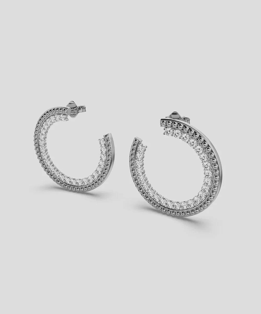 Peelerie jewelry piece in midnight luxury editorial product photo, high-contrast studio lighting