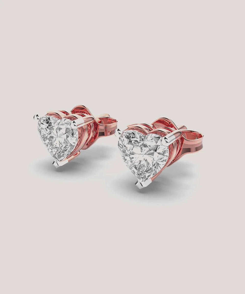 Heart Shape Solitaire Earring in a sleek high-contrast midnight luxury editorial style