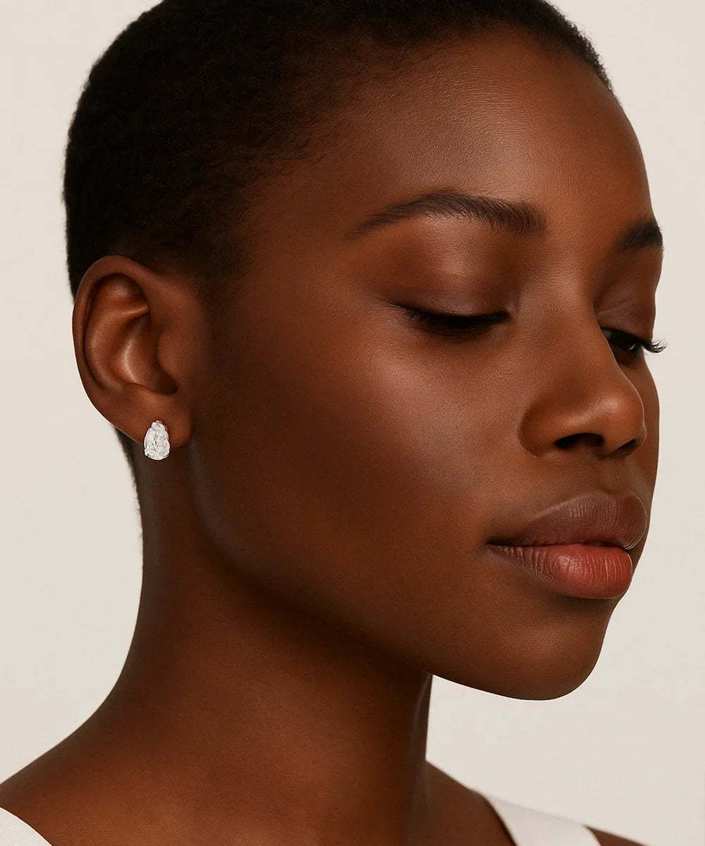 Peelerie jewelry piece in midnight luxury editorial product photo, high-contrast studio lighting