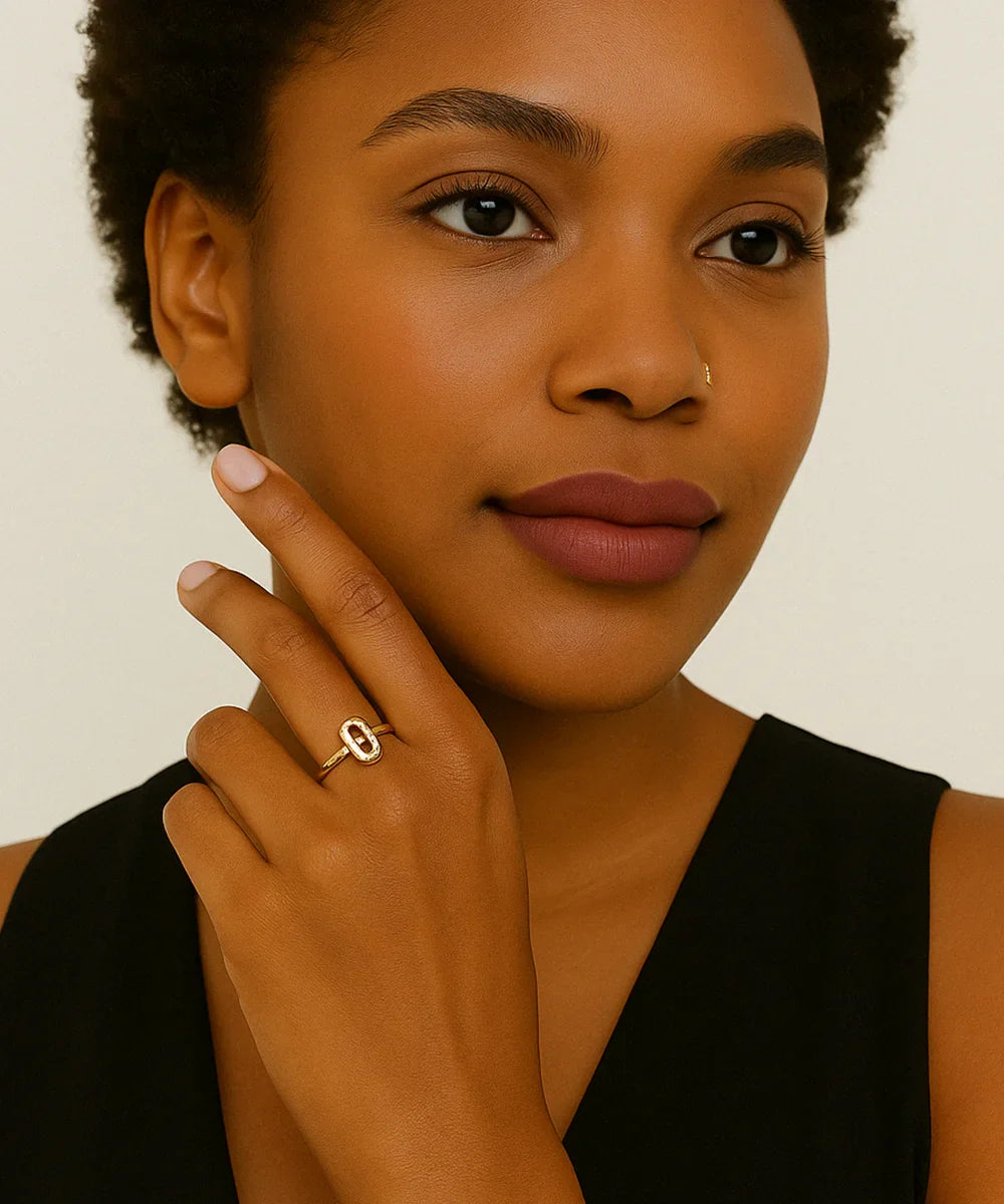 Peelerie jewelry piece in midnight luxury editorial product photo, high-contrast studio lighting