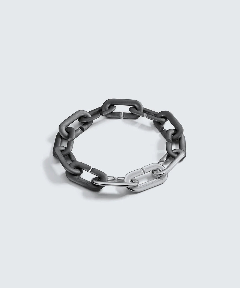 Peelerie jewelry piece in midnight luxury editorial product photo, high-contrast studio lighting