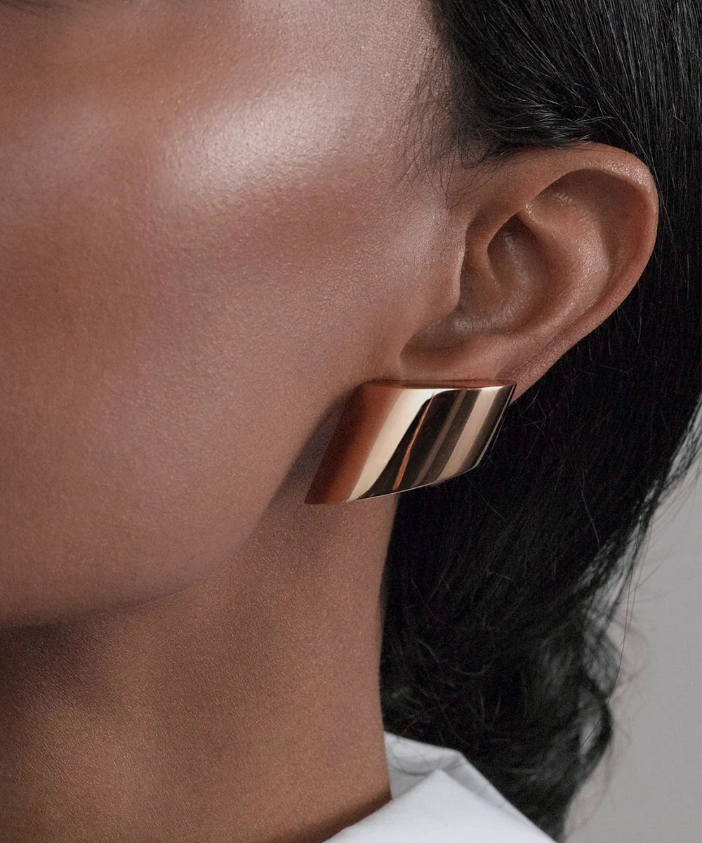 Peelerie jewelry piece in midnight luxury editorial product photo, high-contrast studio lighting