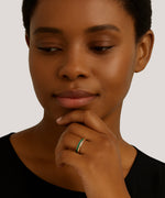 Emerald Women's Gold Ring in a sleek high-contrast midnight luxury editorial style