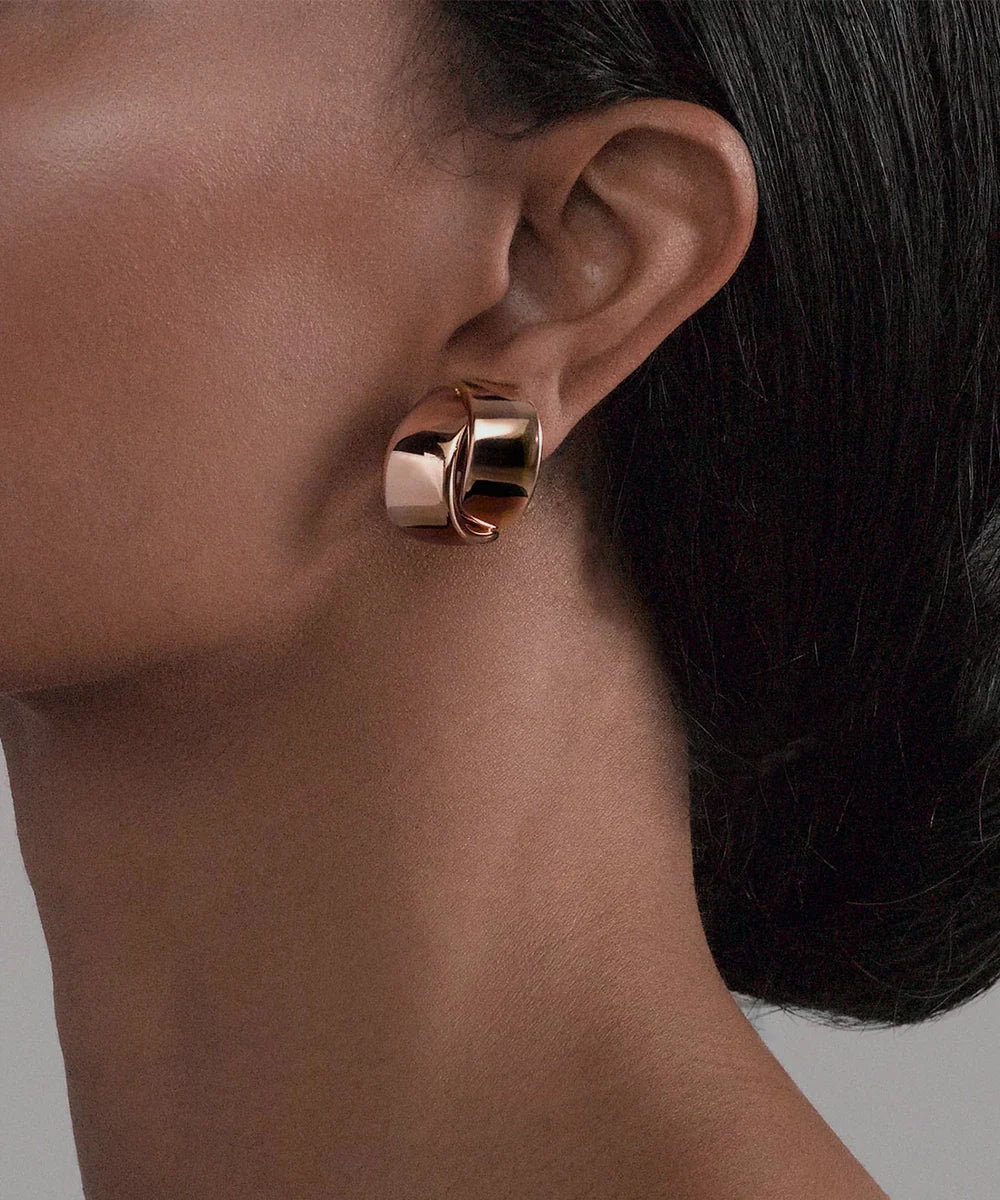 Peelerie jewelry piece in midnight luxury editorial product photo, high-contrast studio lighting