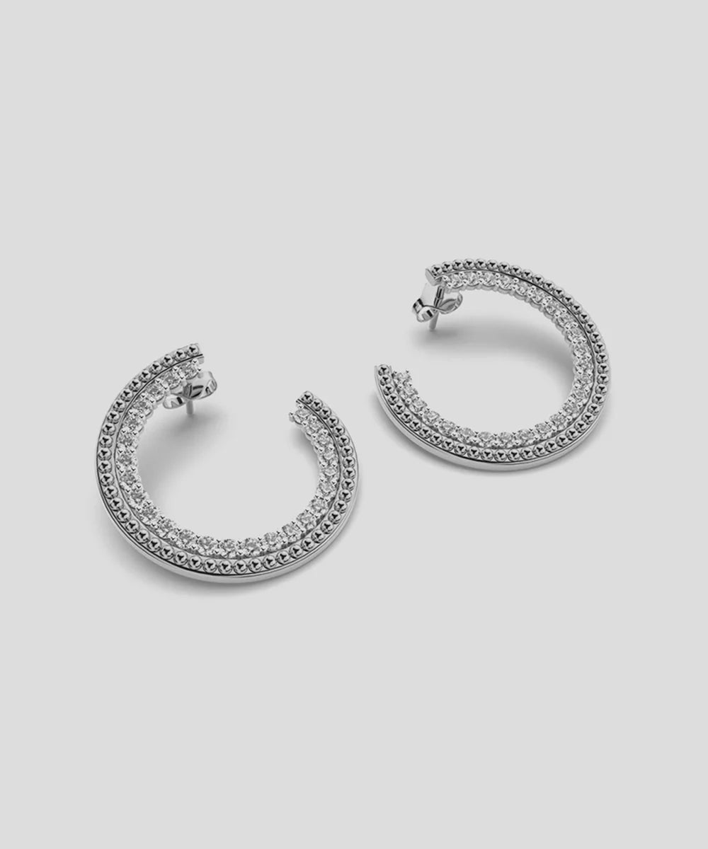 Hoop Huggies Earrings in a sleek high-contrast midnight luxury editorial style