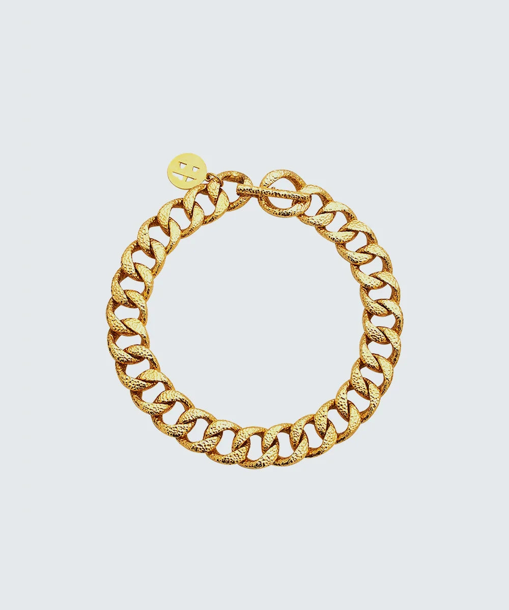 Peelerie jewelry piece in midnight luxury editorial product photo, high-contrast studio lighting