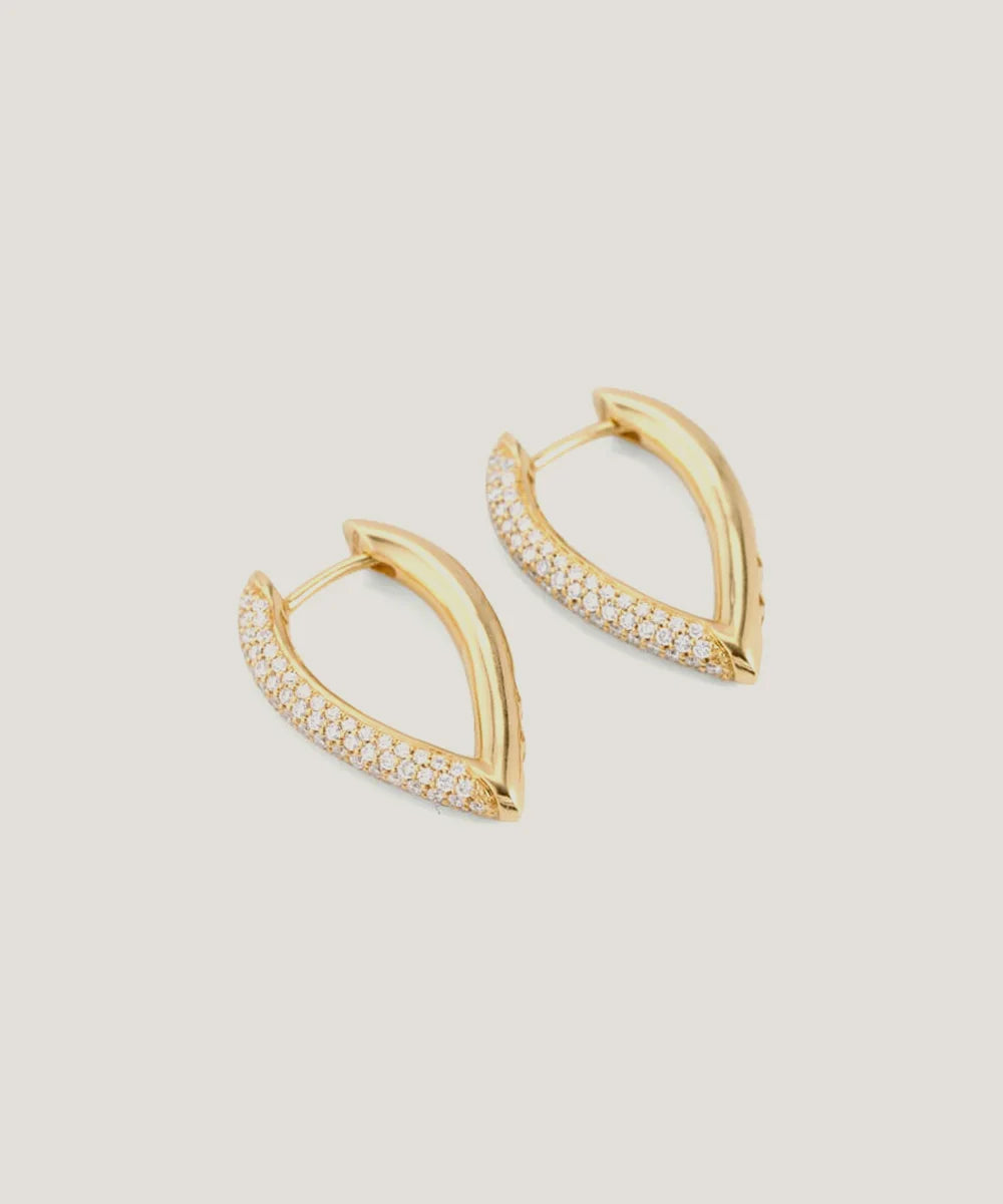 Peelerie jewelry piece in midnight luxury editorial product photo, high-contrast studio lighting