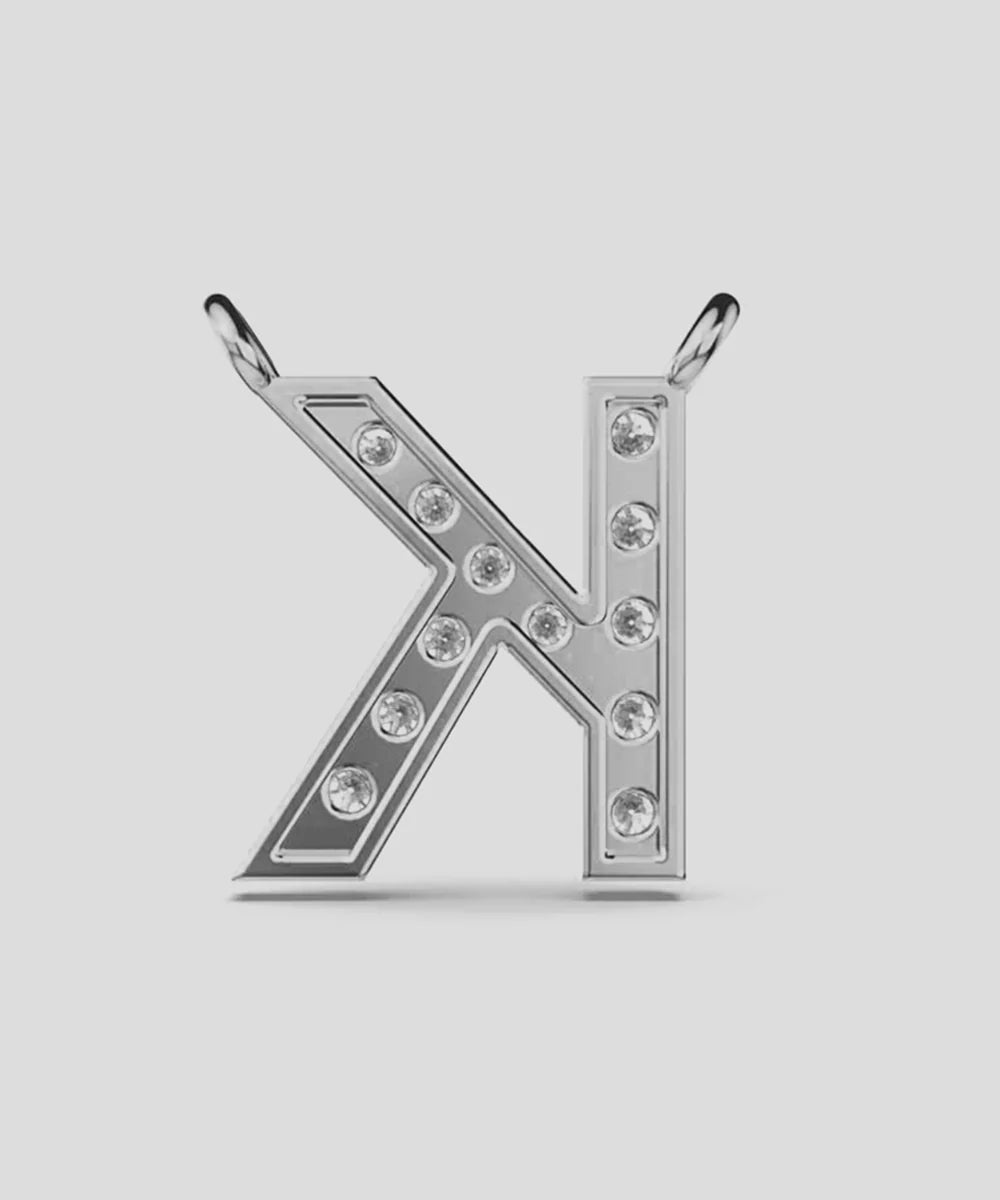 Peelerie jewelry piece in midnight luxury editorial product photo, high-contrast studio lighting