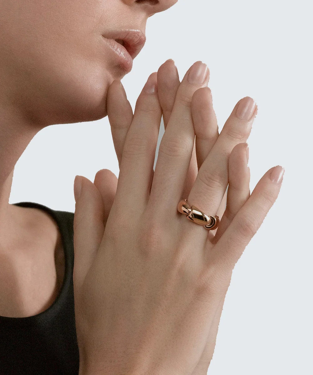 Peelerie jewelry piece in midnight luxury editorial product photo, high-contrast studio lighting