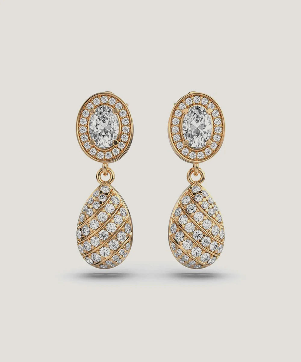 Ball Drop Earrings in a sleek high-contrast midnight luxury editorial style