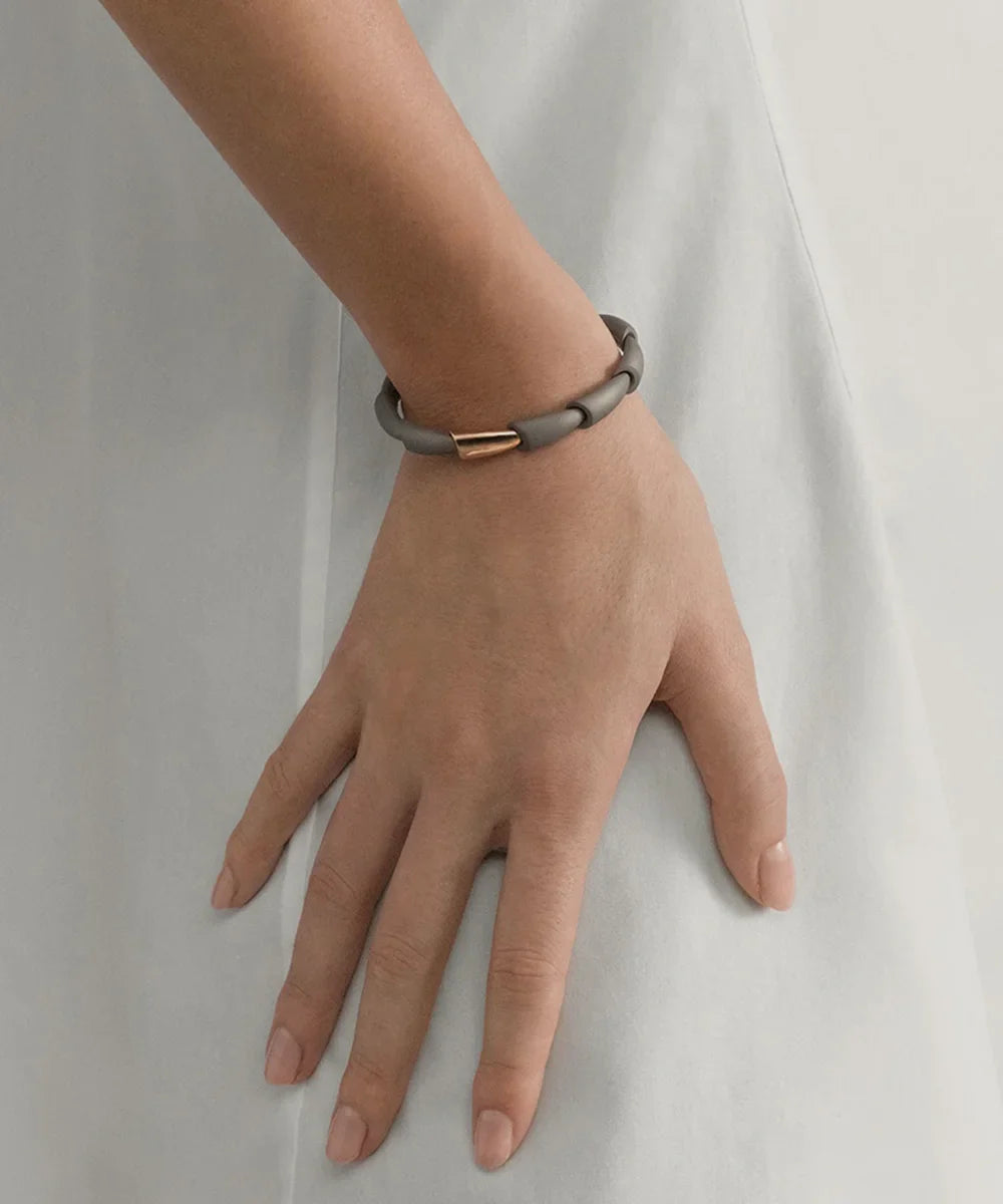 Peelerie jewelry piece in midnight luxury editorial product photo, high-contrast studio lighting