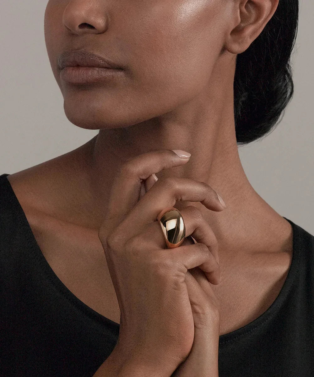 Peelerie jewelry piece in midnight luxury editorial product photo, high-contrast studio lighting