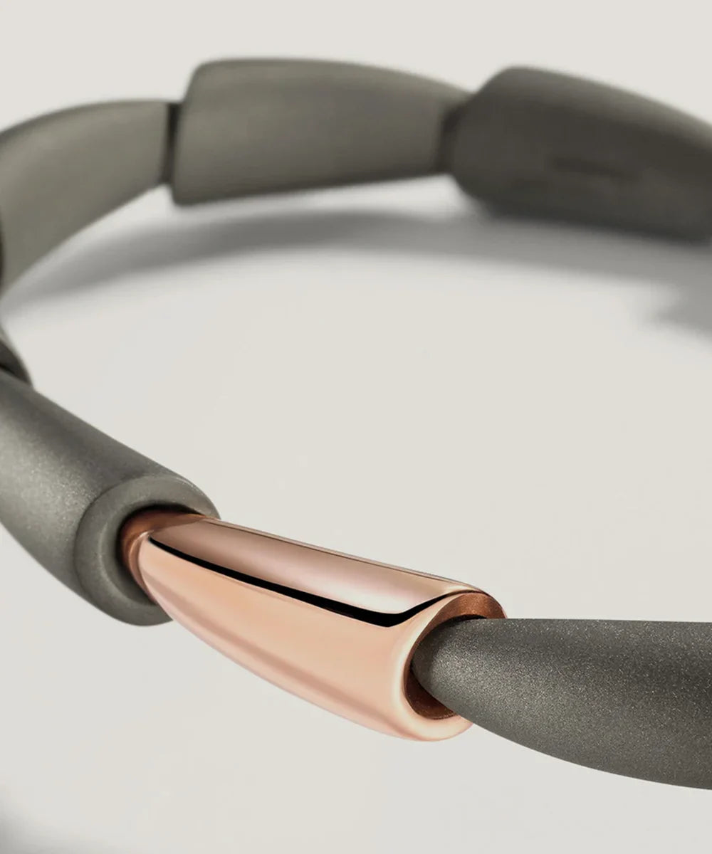 Peelerie jewelry piece in midnight luxury editorial product photo, high-contrast studio lighting