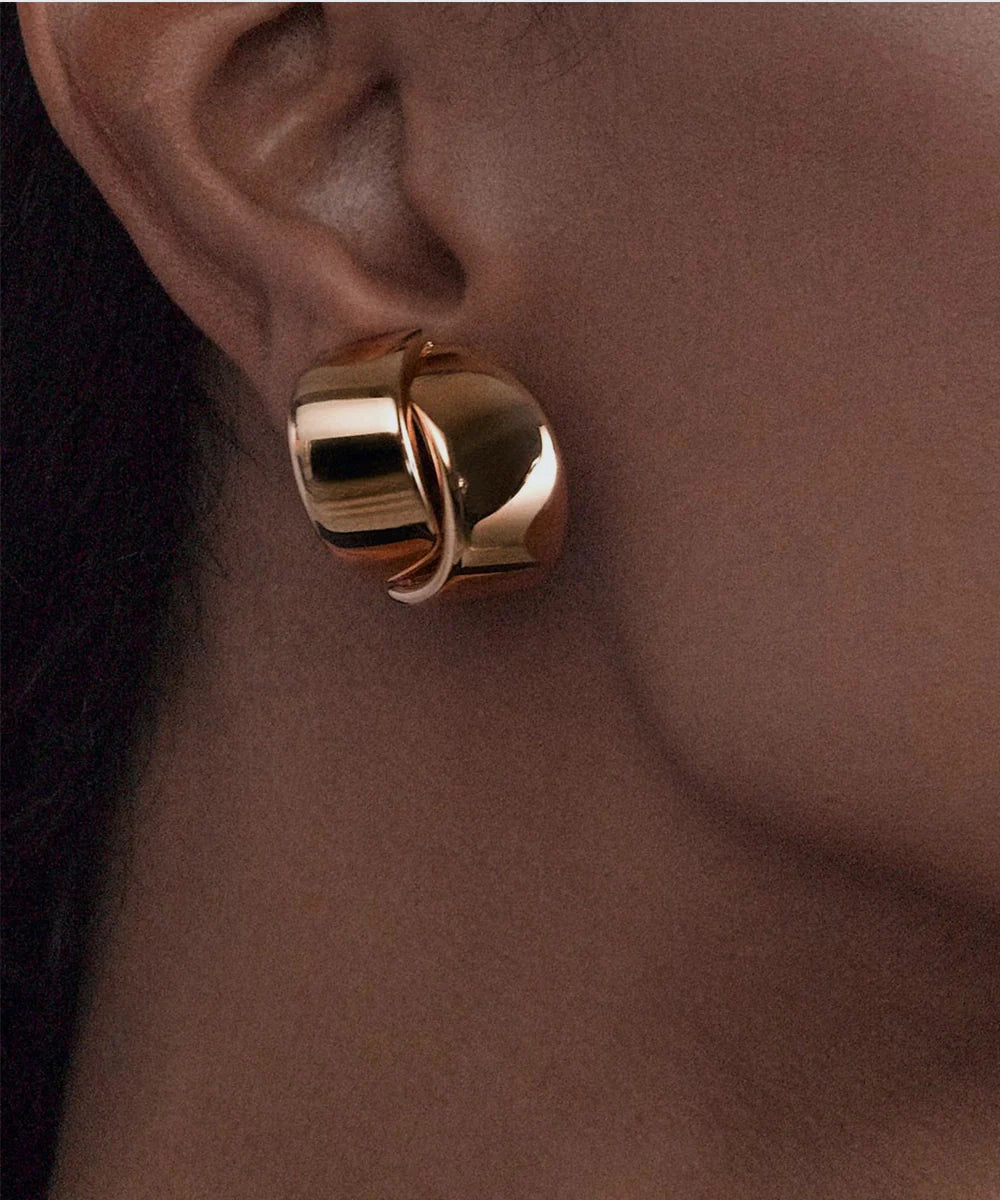 Peelerie jewelry piece in midnight luxury editorial product photo, high-contrast studio lighting