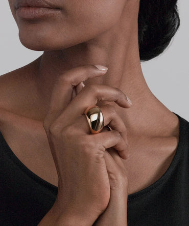 Peelerie jewelry piece in midnight luxury editorial product photo, high-contrast studio lighting