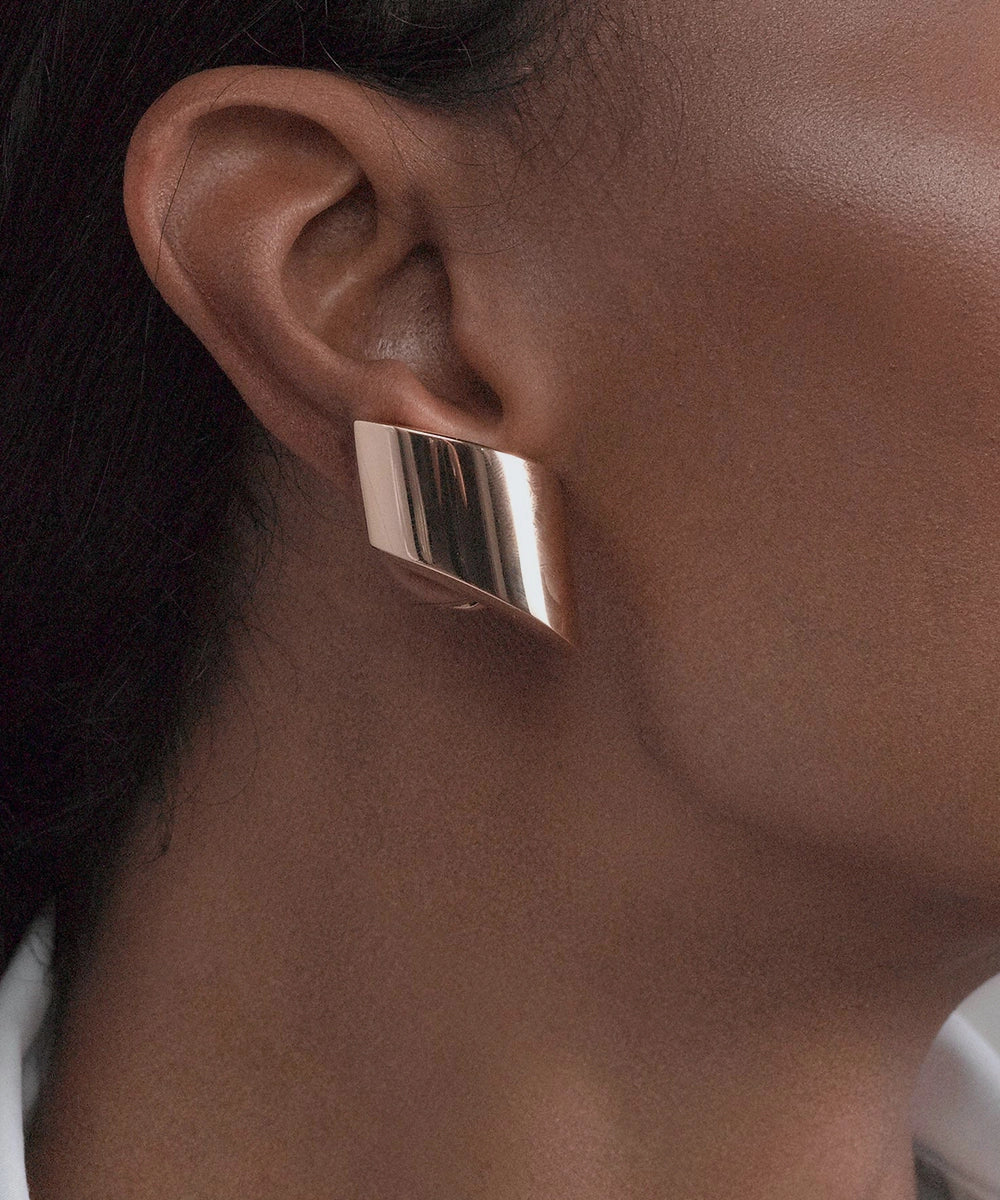 Peelerie jewelry piece in midnight luxury editorial product photo, high-contrast studio lighting