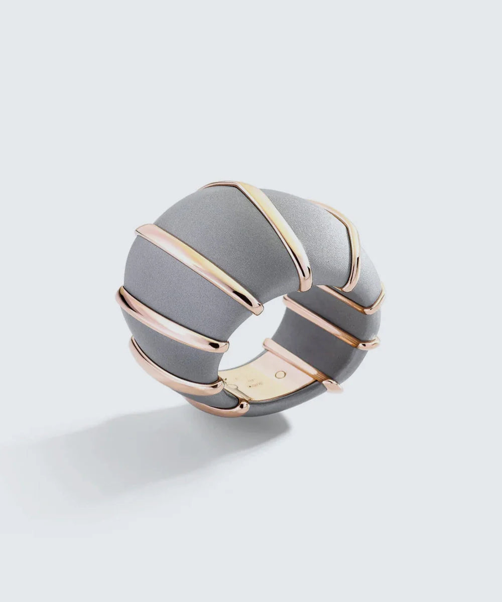 Peelerie jewelry piece in midnight luxury editorial product photo, high-contrast studio lighting