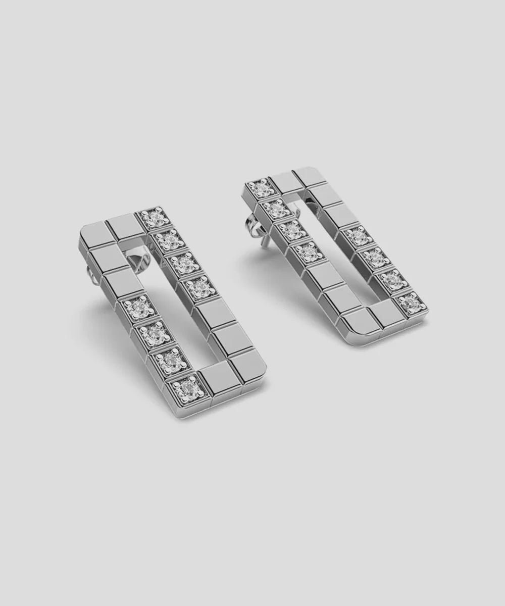 Peelerie jewelry piece in midnight luxury editorial product photo, high-contrast studio lighting