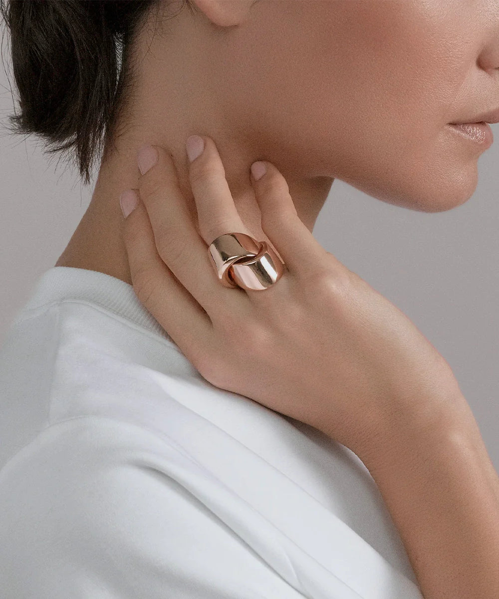 Peelerie jewelry piece in midnight luxury editorial product photo, high-contrast studio lighting