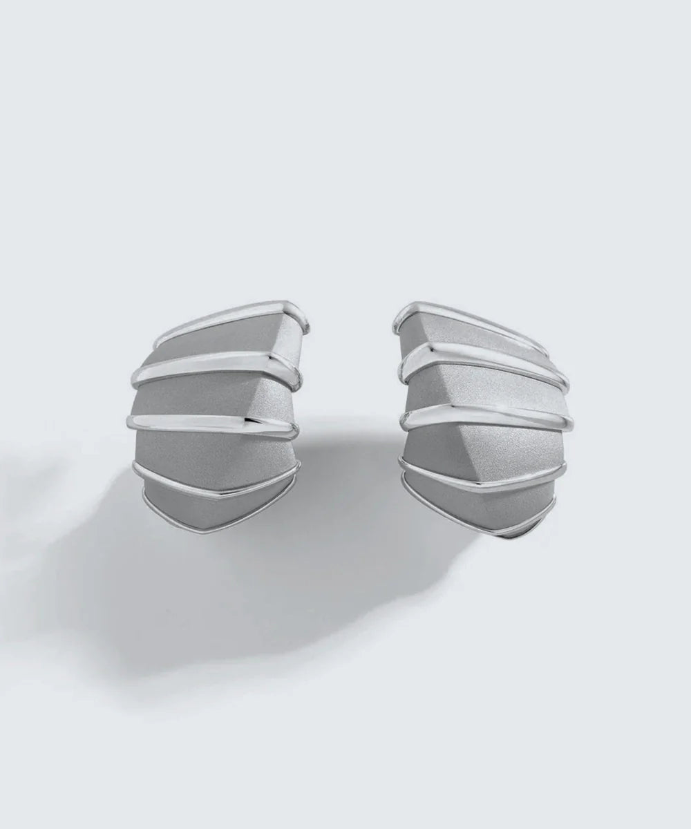 Peelerie jewelry piece in midnight luxury editorial product photo, high-contrast studio lighting