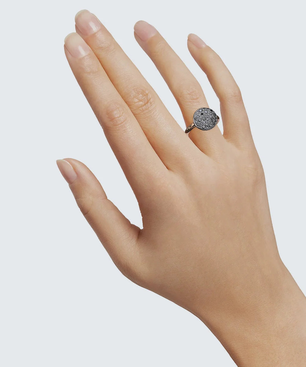 Peelerie jewelry piece in midnight luxury editorial product photo, high-contrast studio lighting