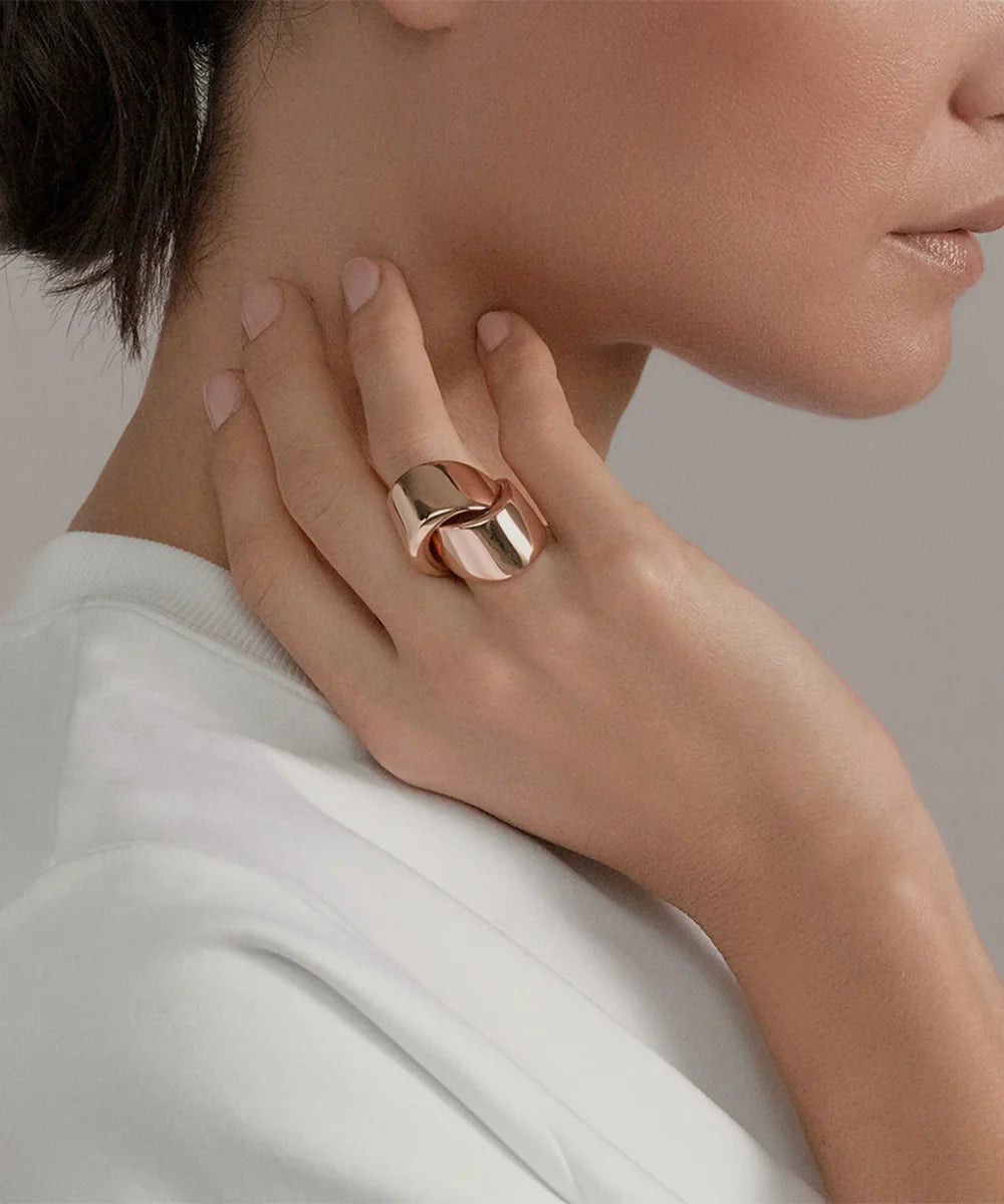 Peelerie jewelry piece in midnight luxury editorial product photo, high-contrast studio lighting