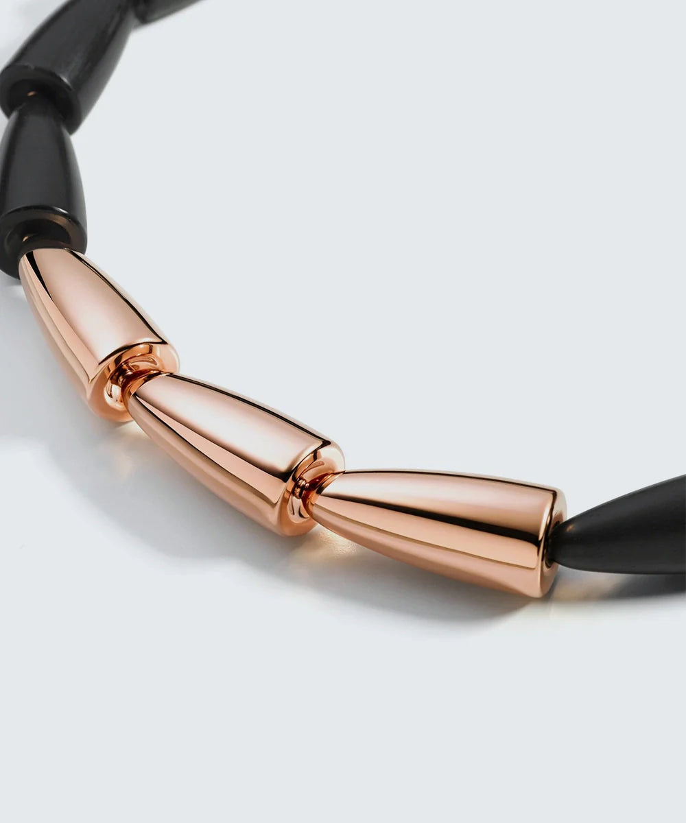 Peelerie jewelry piece in midnight luxury editorial product photo, high-contrast studio lighting