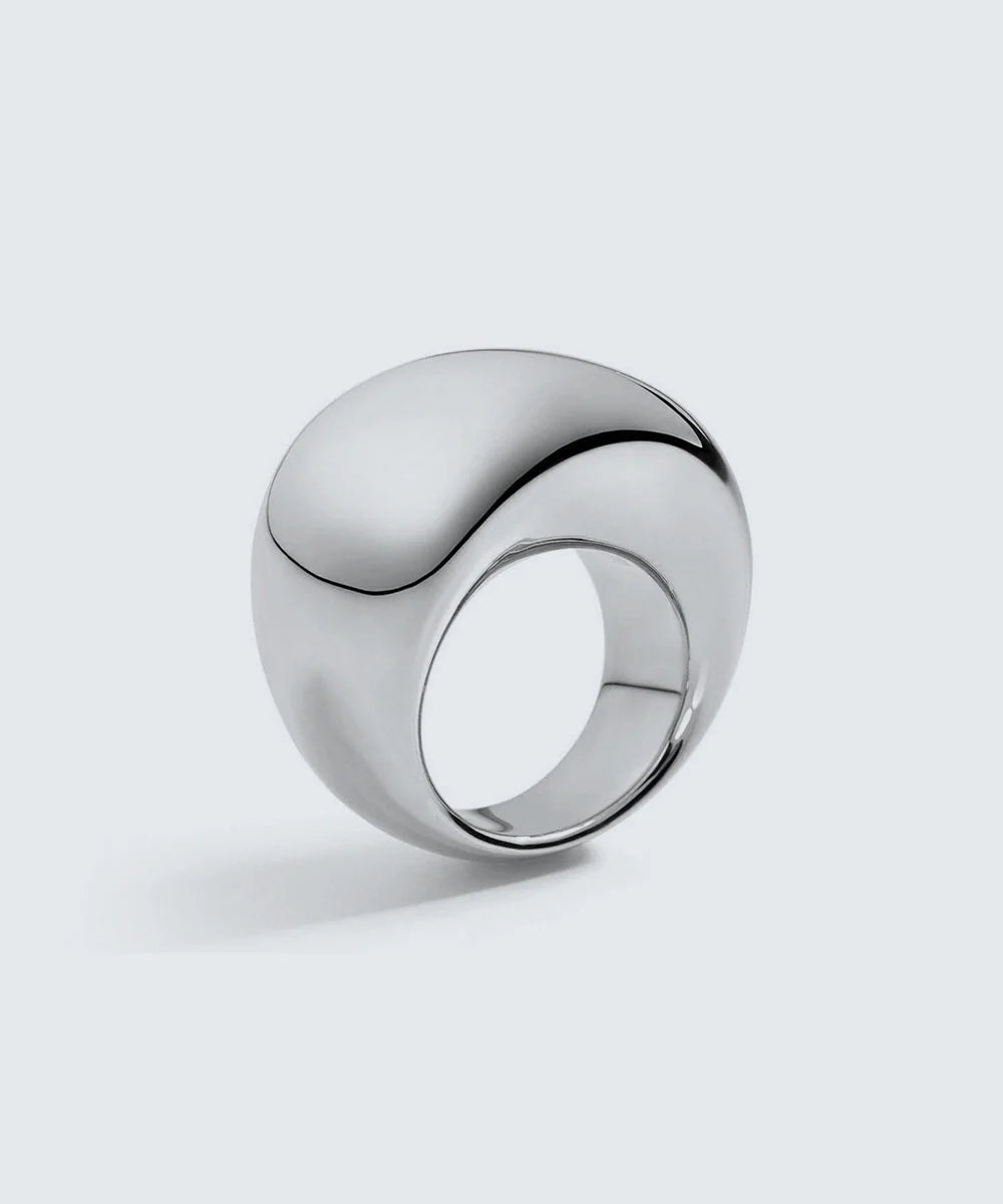 Peelerie jewelry piece in midnight luxury editorial product photo, high-contrast studio lighting