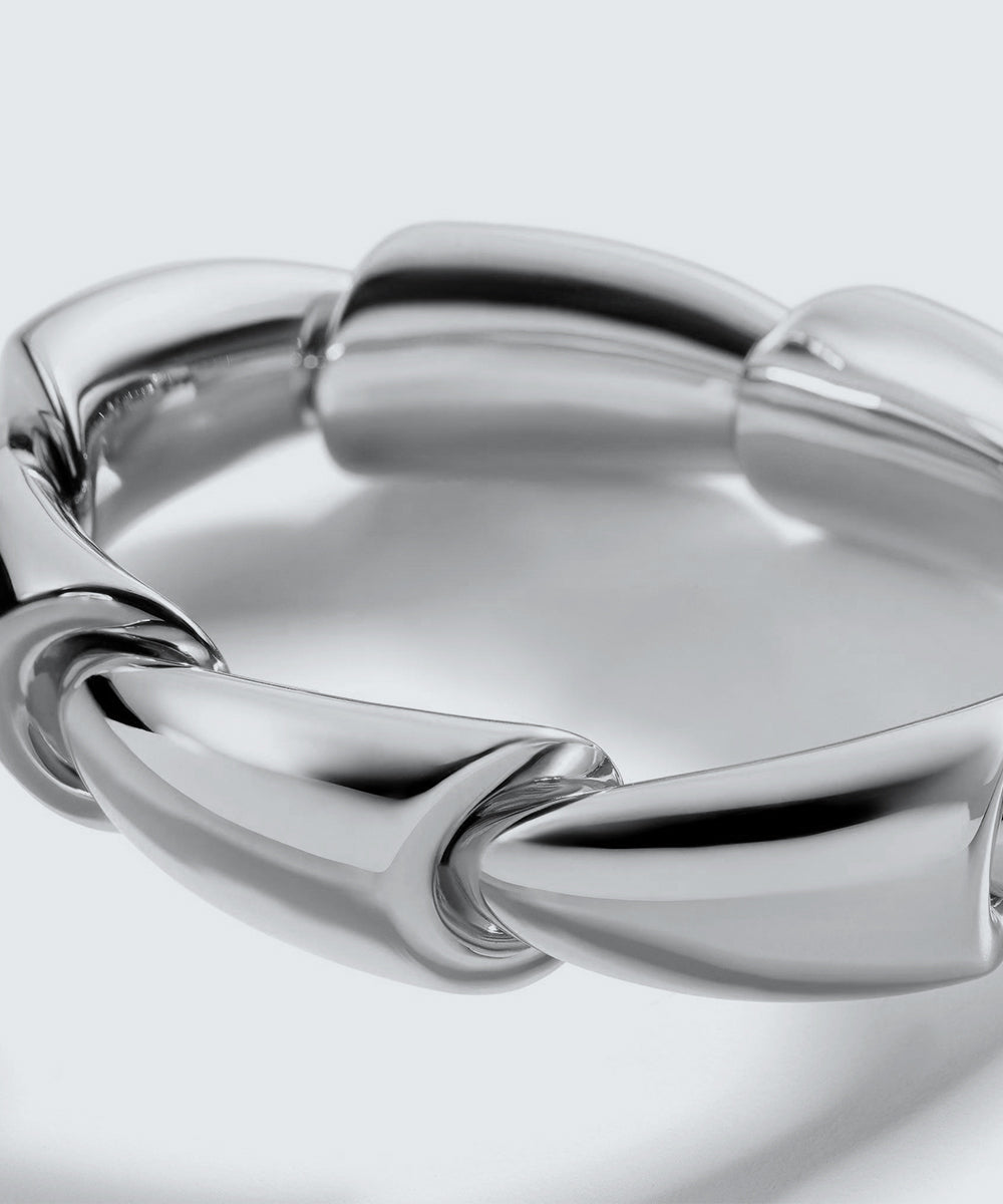 Peelerie jewelry piece in midnight luxury editorial product photo, high-contrast studio lighting