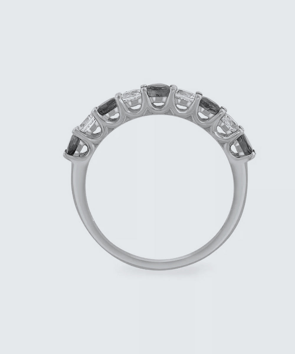 Peelerie jewelry piece in midnight luxury editorial product photo, high-contrast studio lighting