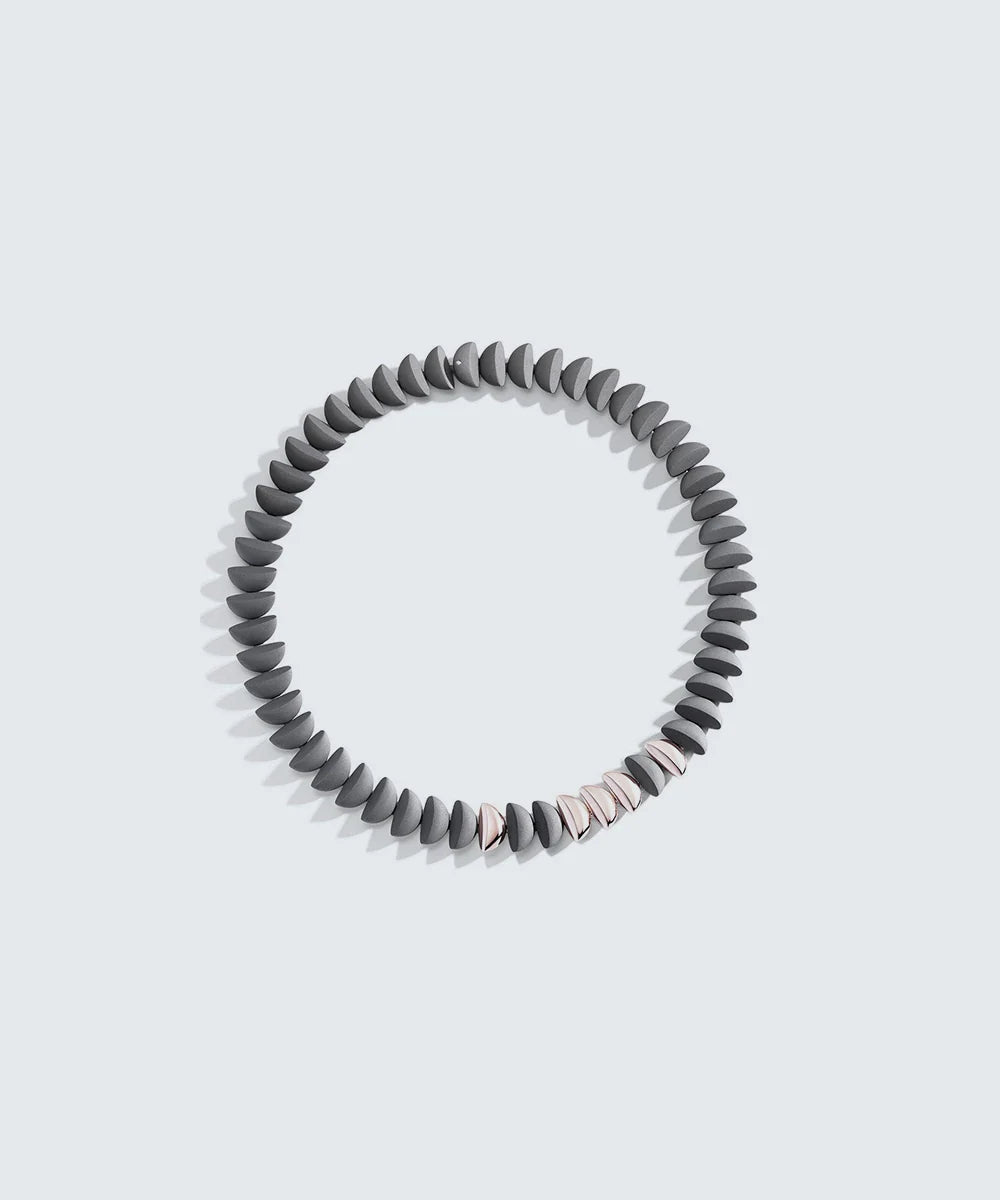 Peelerie jewelry piece in midnight luxury editorial product photo, high-contrast studio lighting