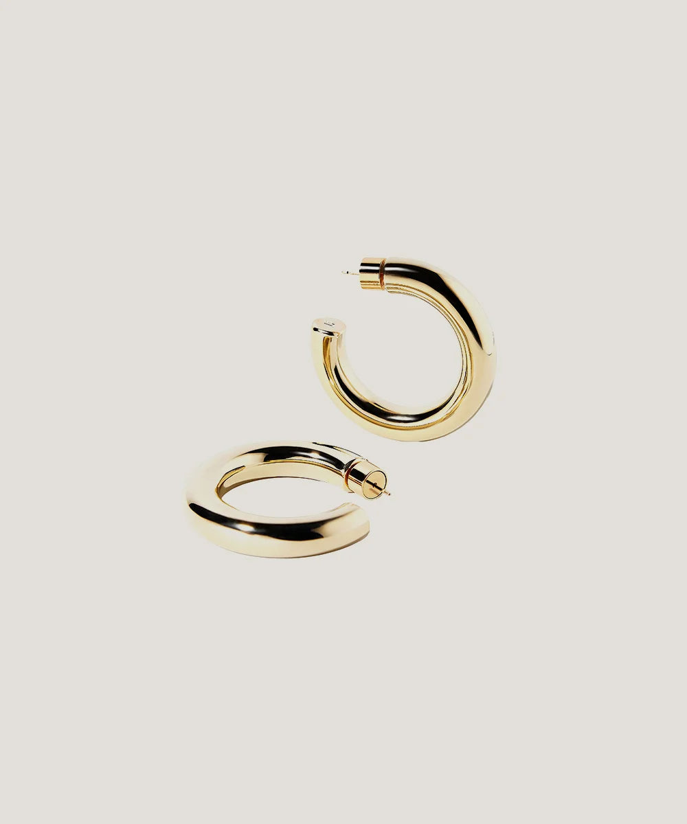 Peelerie jewelry piece in midnight luxury editorial product photo, high-contrast studio lighting