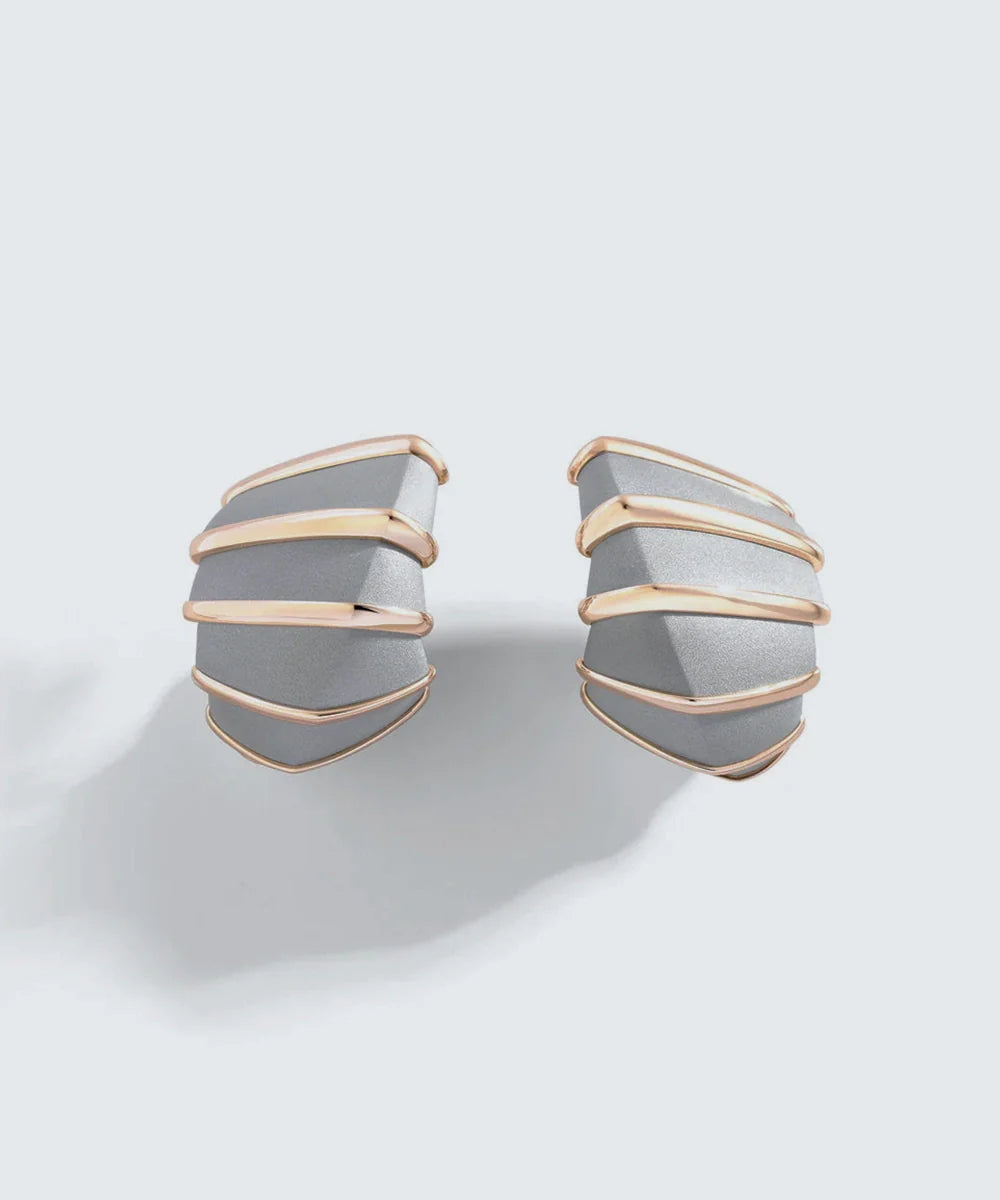 Peelerie jewelry piece in midnight luxury editorial product photo, high-contrast studio lighting