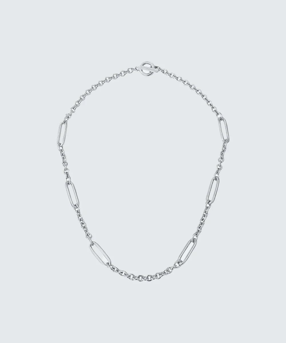 Peelerie jewelry piece in midnight luxury editorial product photo, high-contrast studio lighting