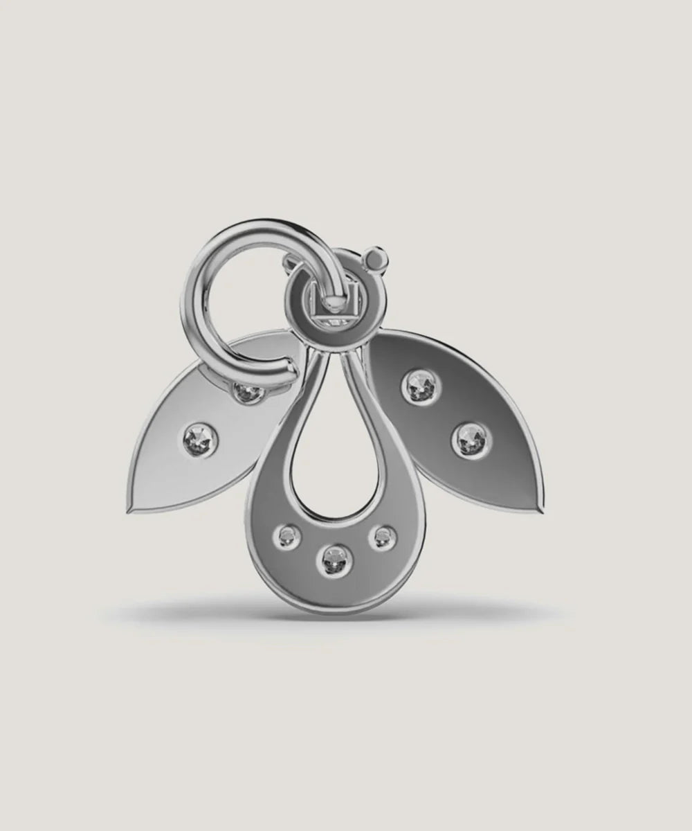 Peelerie jewelry piece in midnight luxury editorial product photo, high-contrast studio lighting