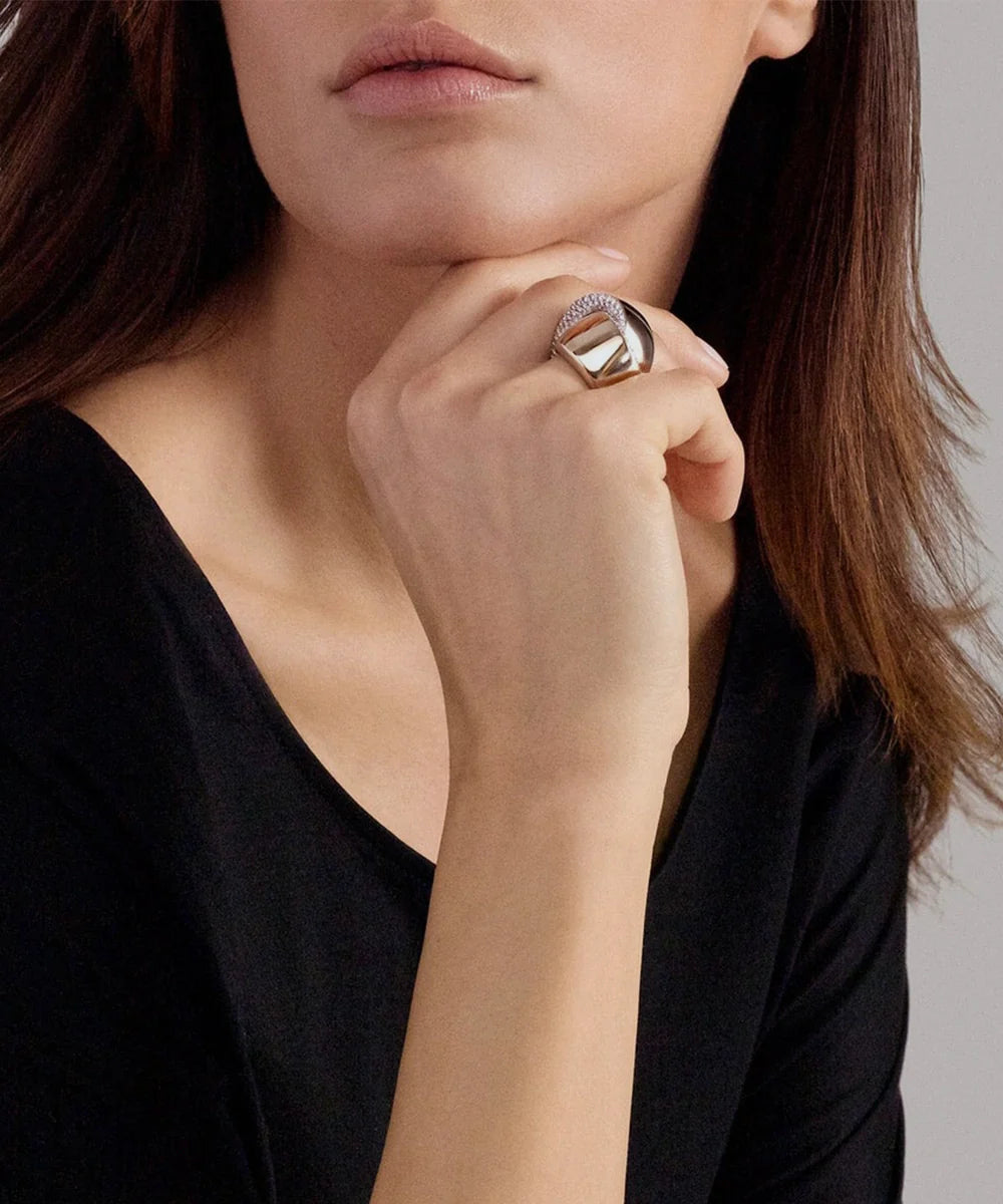 Peelerie jewelry piece in midnight luxury editorial product photo, high-contrast studio lighting