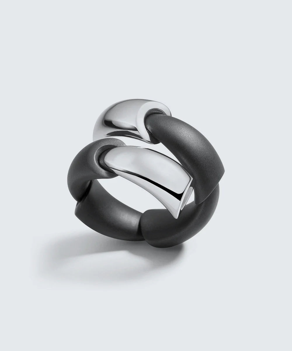 Peelerie jewelry piece in midnight luxury editorial product photo, high-contrast studio lighting